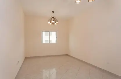 Empty Room image for: Apartment - 1 Bedroom - 2 Bathrooms for rent in Zafranah Building - Al Nahda 1 - Al Nahda - Dubai, Image 1