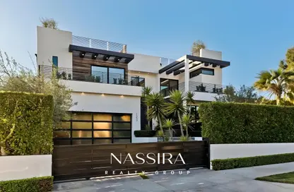 Villa - 5 Bedrooms - 7 Bathrooms for sale in Nad Al Sheba Gardens - Nad Al Sheba 1 - Nad Al Sheba - Dubai