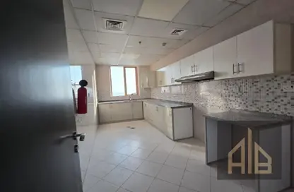 Apartment - 2 Bedrooms - 3 Bathrooms for sale in Al Ghoroub Tower - Al Alia - Ajman