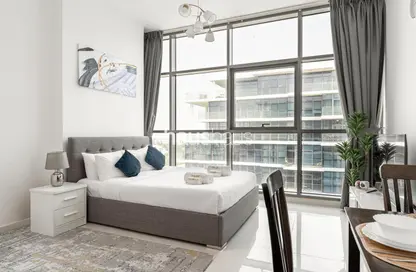 Room / Bedroom image for: Apartment - 1 Bathroom for rent in Loreto 3 B - Loreto - DAMAC Hills - Dubai, Image 1