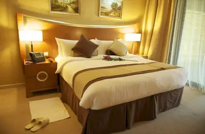 صورة لـ غرفة- غرفة النوم النزل و الشقق الفندقية - 2 غرف نوم - 2 حمامات للايجار في فندق جراند بلفيو - برشا هايتس (تيكوم) - دبي ، صورة رقم 1