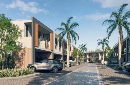 Townhouse - 2 Bedrooms - 4 Bathrooms for sale in Reportage Village 1 - Dubai Land - Dubai