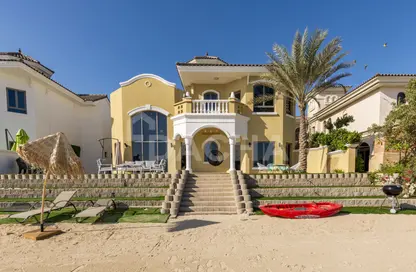 Outdoor House image for: Villa - 4 Bedrooms - 4 Bathrooms for rent in Garden Homes Frond B - Garden Homes - Palm Jumeirah - Dubai, Image 1