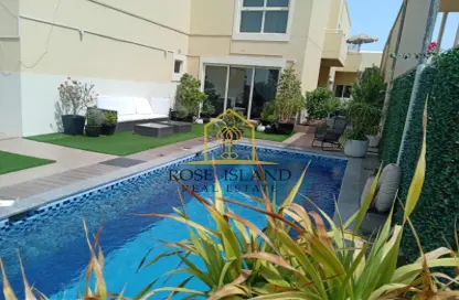 Pool image for: Villa - 5 Bedrooms - 6 Bathrooms for sale in Al Ward - Al Raha Gardens - Abu Dhabi, Image 1