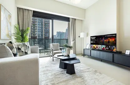 Living Room image for: Apartment - 1 Bedroom - 1 Bathroom for rent in Act Towers - Opera District - Downtown Dubai - Dubai, Image 1