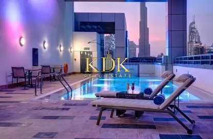 Apartment - 1 Bedroom - 2 Bathrooms for rent in Royal Continental Suites - Business Bay - Dubai