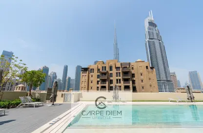 صورة لـ حوض سباحة شقة - غرفة نوم - 1 حمام للايجار في برج رويال - دبي وسط المدينة - دبي ، صورة رقم 1