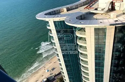 Apartment - 3 Bedrooms - 4 Bathrooms for sale in Corniche Tower - Ajman Corniche Road - Ajman