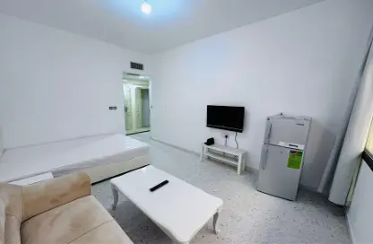 Apartment - Studio - 1 Bathroom for rent in Tourist Club Area - Abu Dhabi